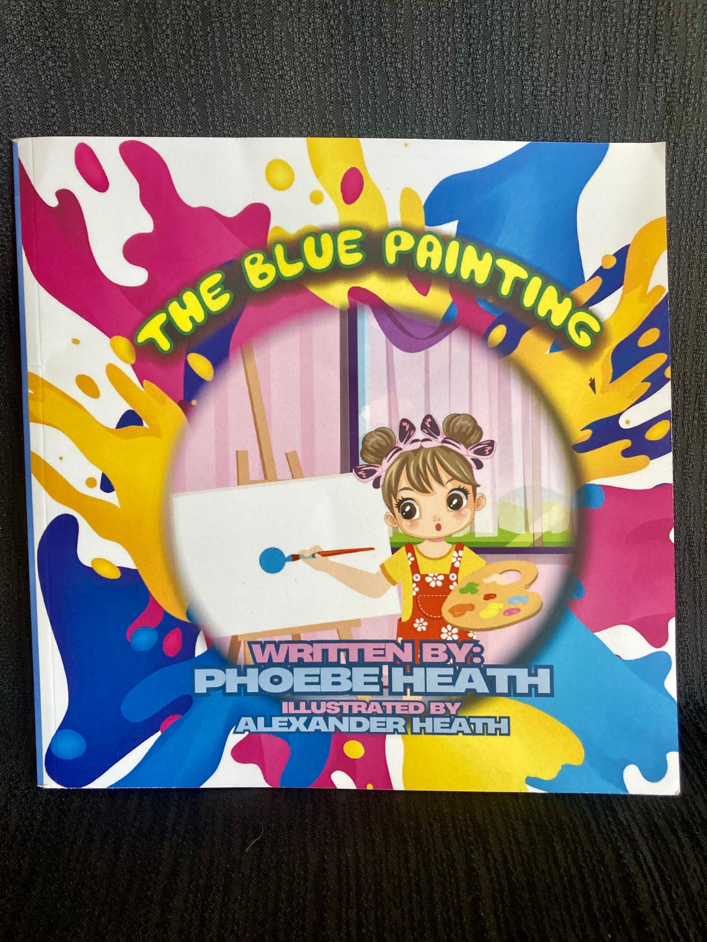 Children's book Coda author The Blue Painting with colorful paint splashes and illustrated girl holding paintbrush