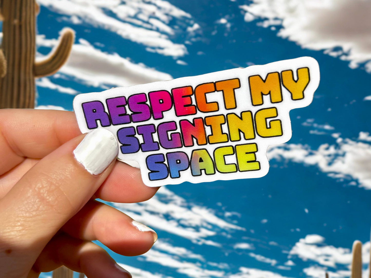 Colorful sticker saying Respect My Signing Space with sky background for ASL pasta bundle deal