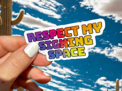 Colorful sticker saying Respect My Signing Space with sky background for ASL pasta bundle deal