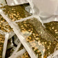 Basil pesto seasoning with dried garlic mix in clear resealable packaging from Parents Gone Hiatus